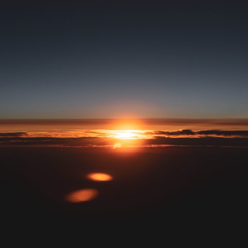 body of water during sunset